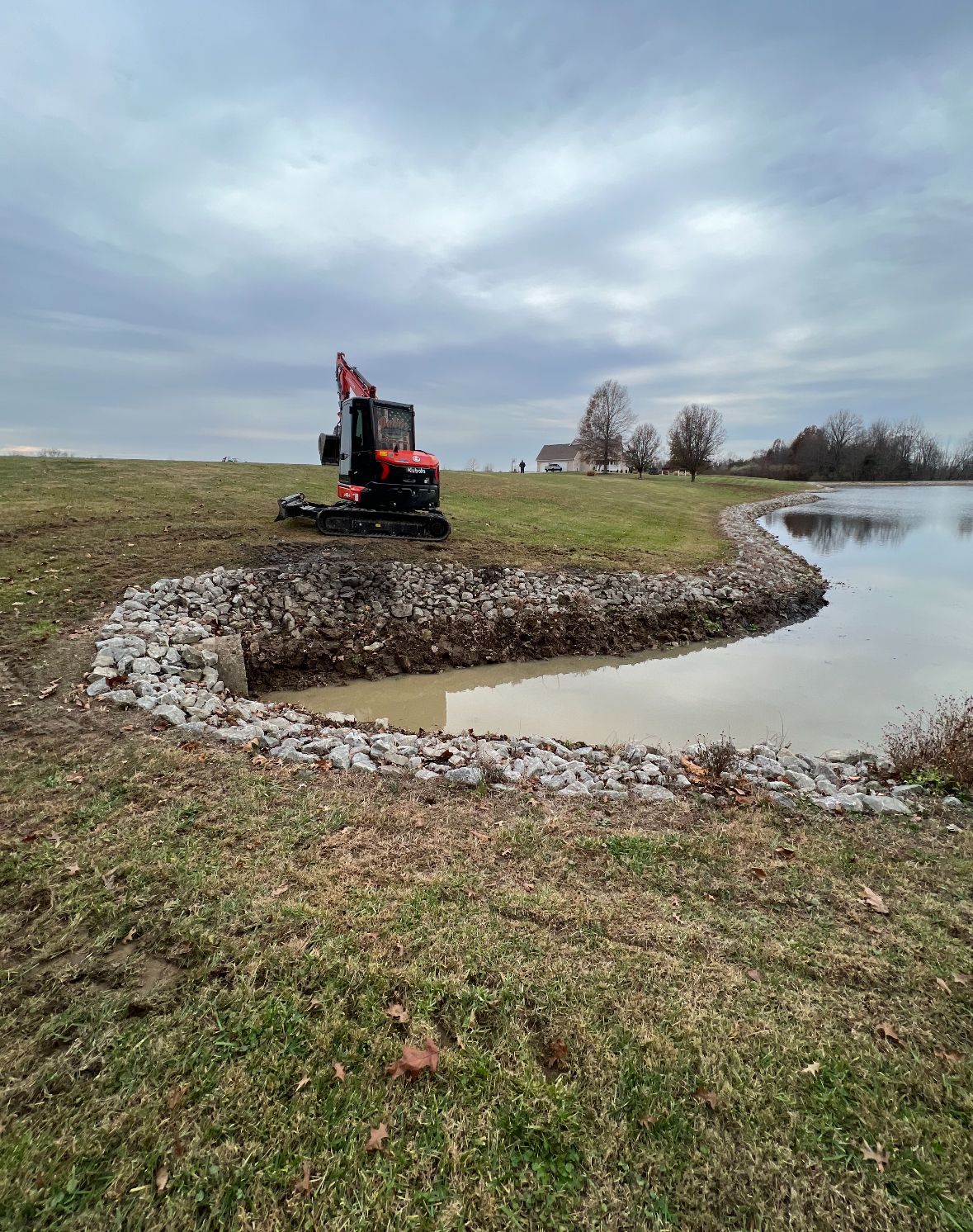 A Red And Black Tractor — Scottsburg, IN — Babbs Land Management LLC