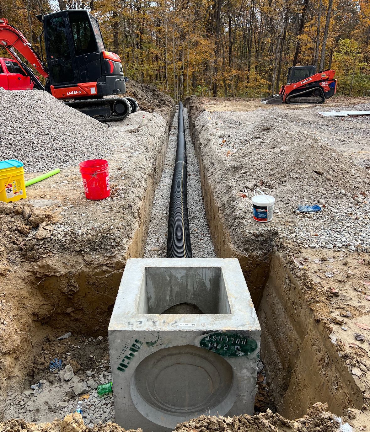 A Sewer Pipe Being Installed Underground — Scottsburg, IN — Babbs Land Management LLC