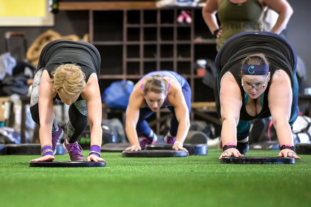 Women exercising at a Crossfit Gym