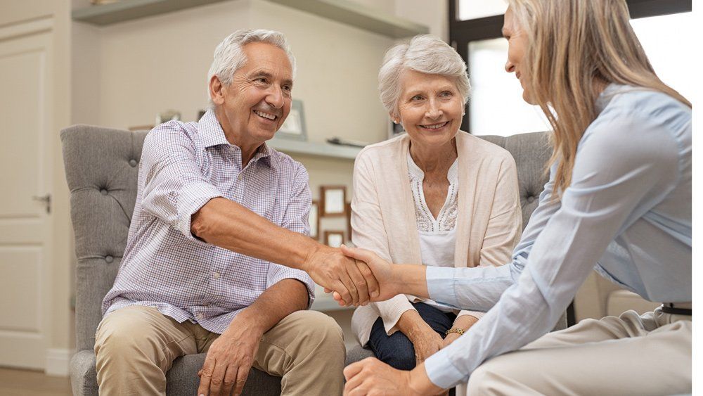 Senior Couple And Insurance Agent — Great Falls, MT — Senior Insurance Market