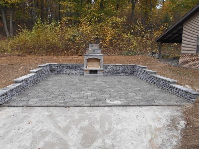 There Is a Fireplace in The Middle of The Patio.