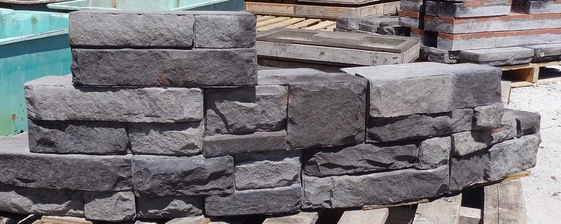 A Pile of Bricks Are Stacked on Top of Each Other on A Wooden Pallet.