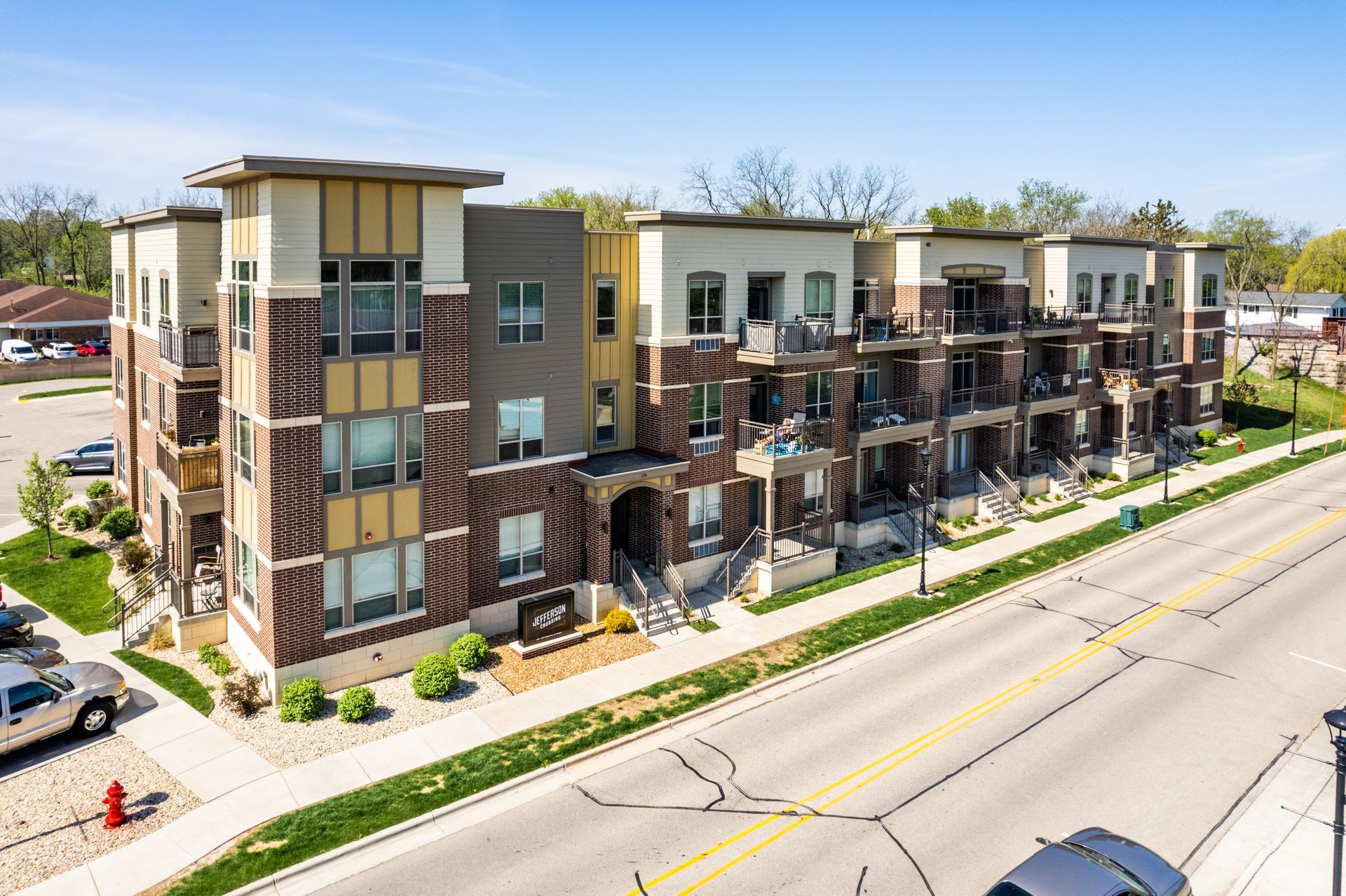 an aerial view of a brick apartment building with a sign that says ' liberty ' on it
