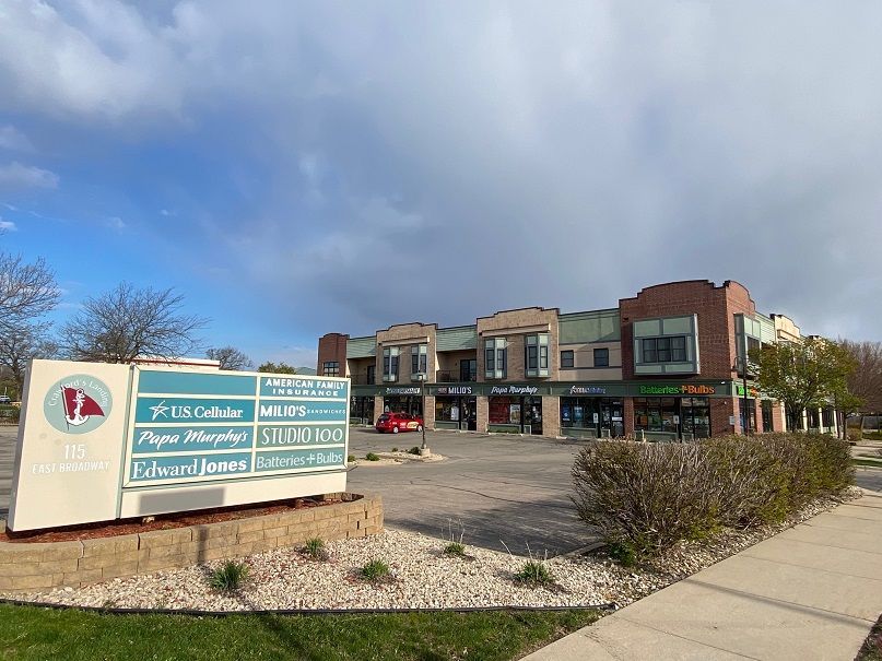 a sign in front of a building that says american family insurance