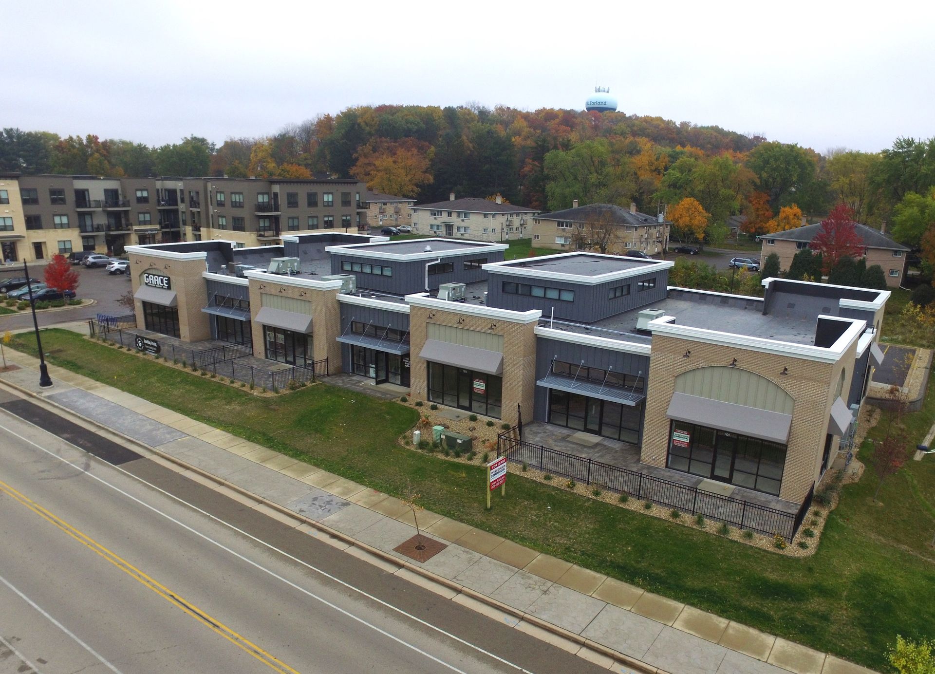 an aerial view of a building with a sign that says 
