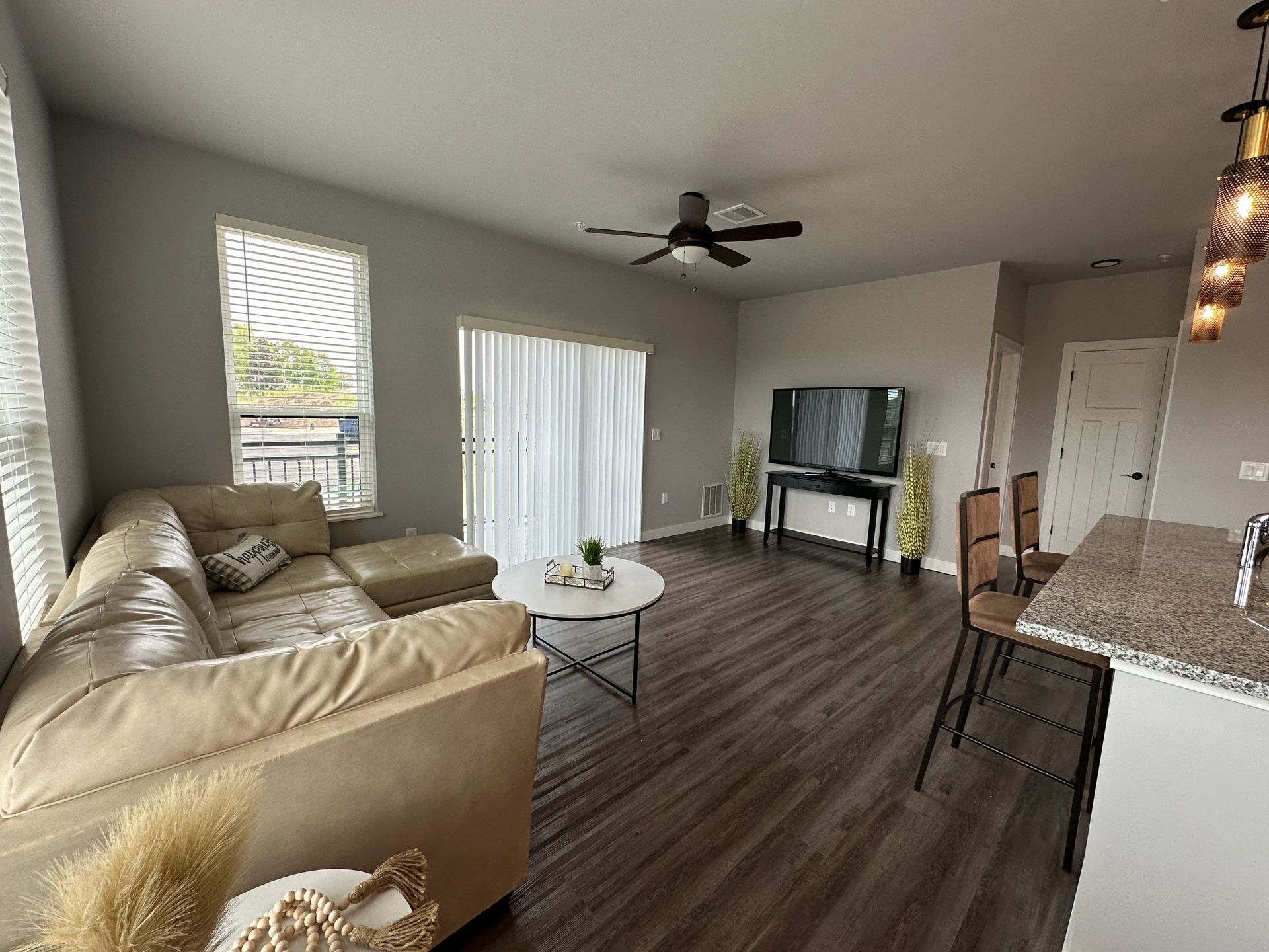 a living room with a couch and a flat screen tv