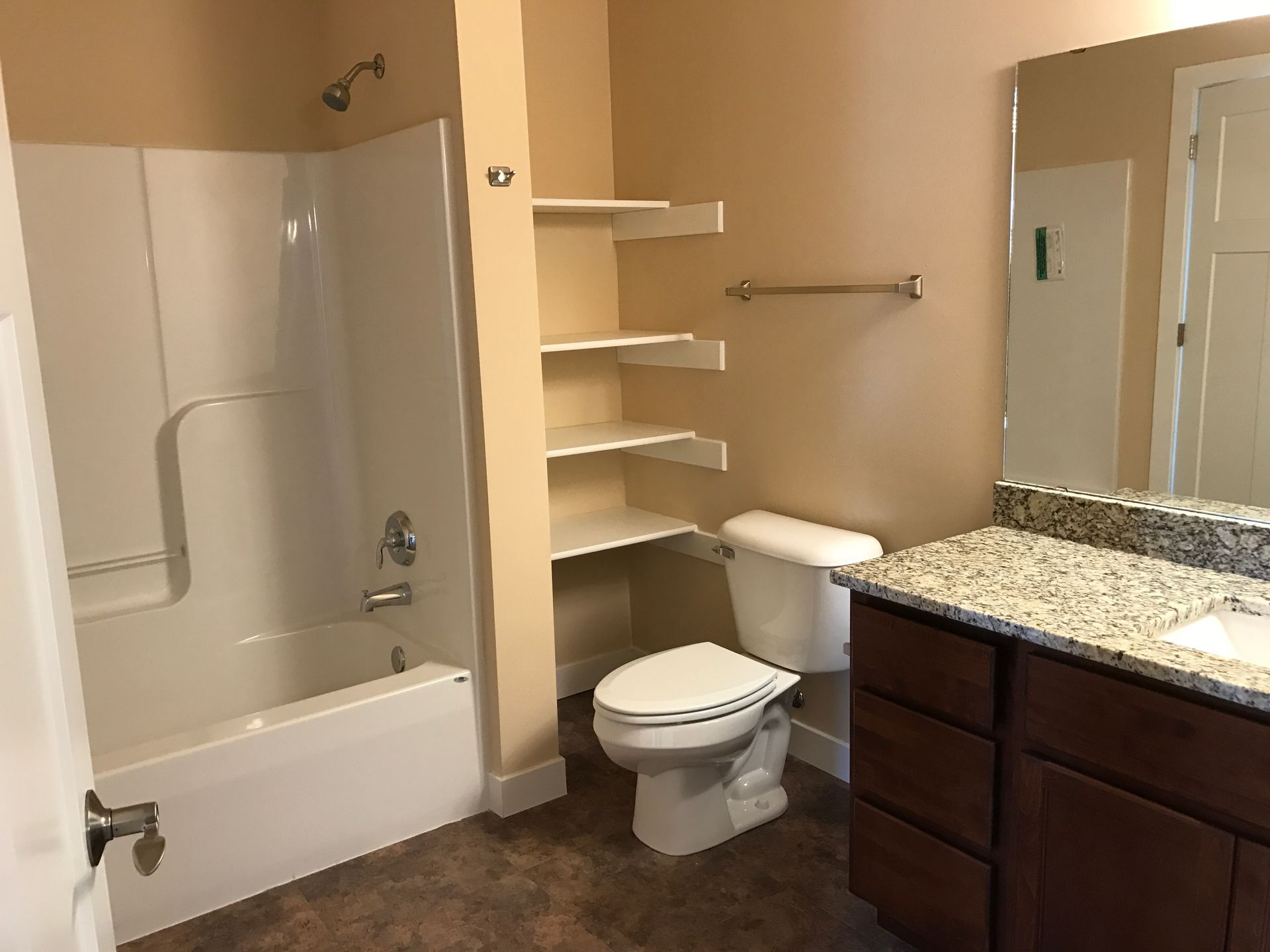 a bathroom with a toilet a sink and a bathtub