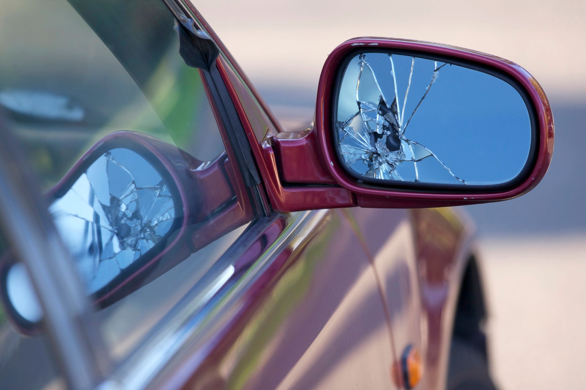 A broken car mirror glass.
