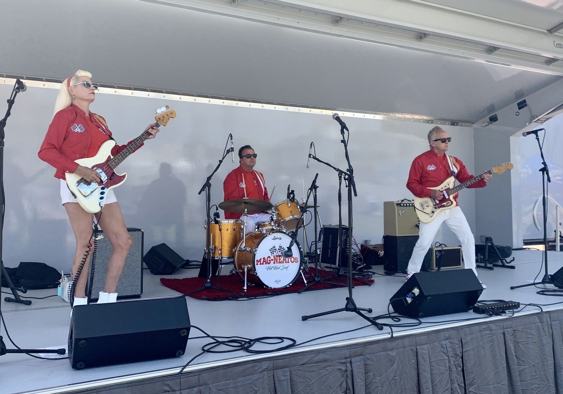 A group of people are playing instruments on a stage.