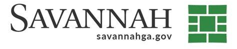 The city of savannah logo is green and white with a diamond in the middle.
