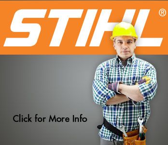 Construction worker with his arms crossed standing in front of a STIHL sign.