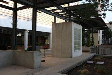 A building with a concrete block in the middle of it