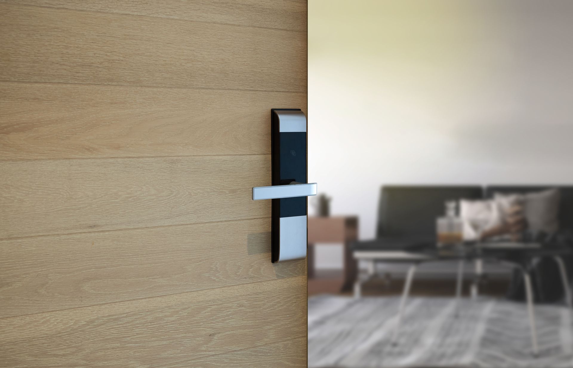 A door with a door handle on it is open to a living room.