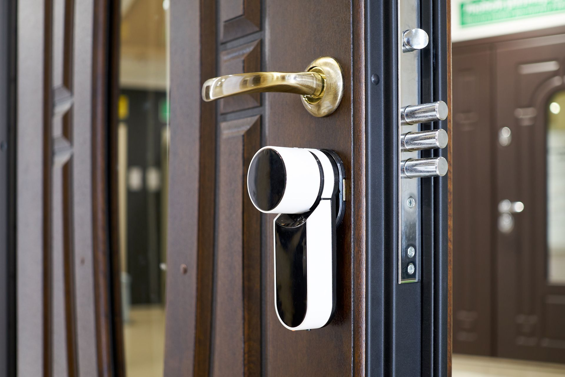 A close up of a door with a handle and lock.