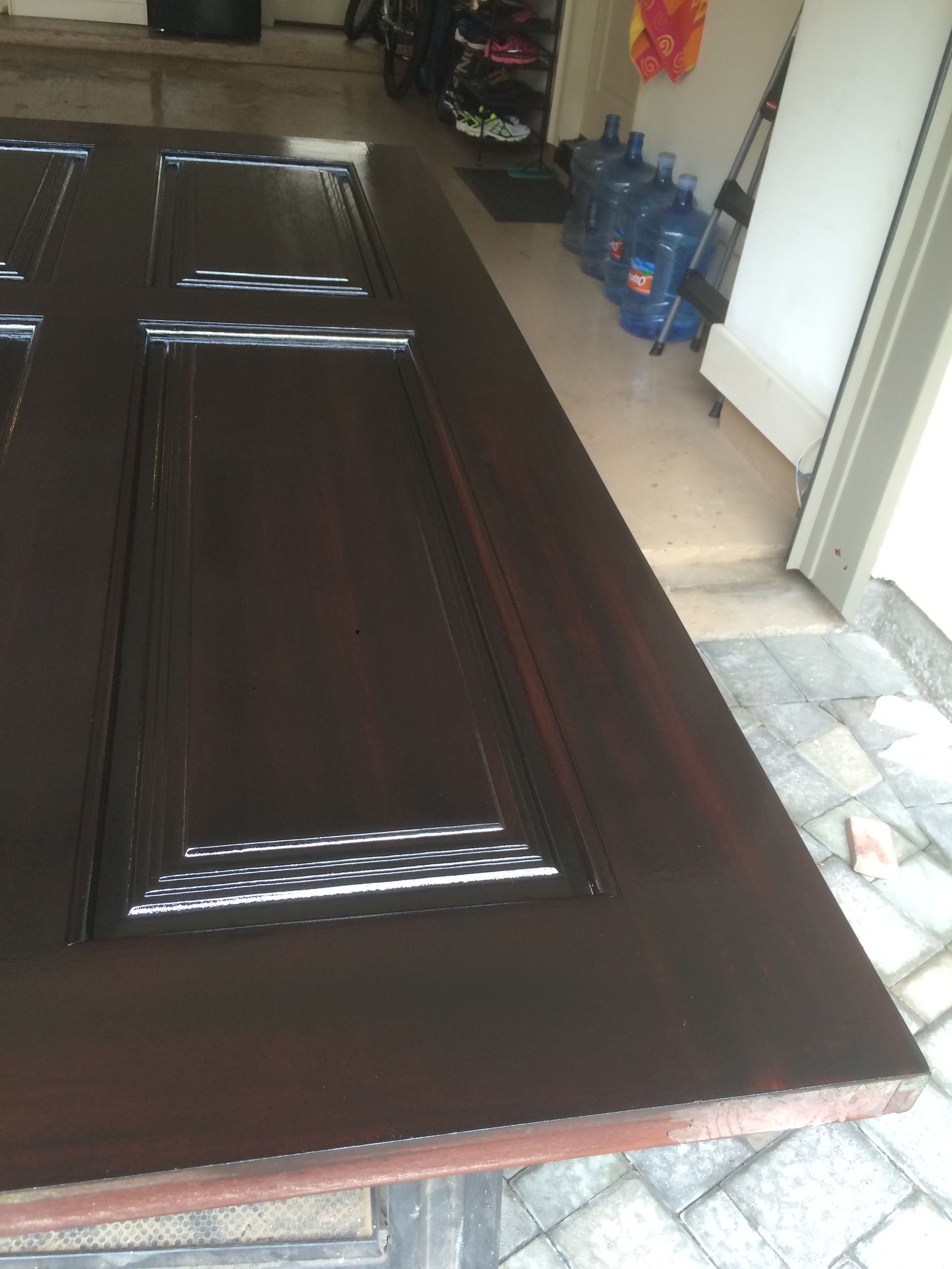 A sliding glass door is open to a tiled floor.