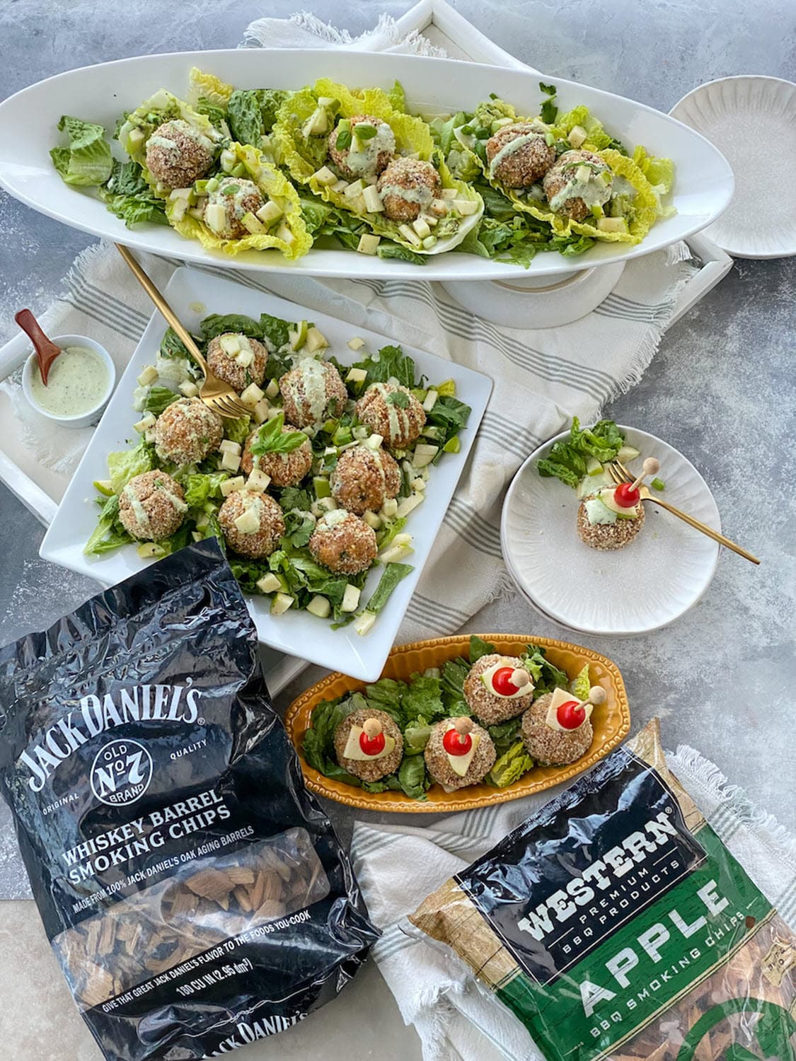 Chicken meatball lettuce wraps, skewers with bags of smoking chips