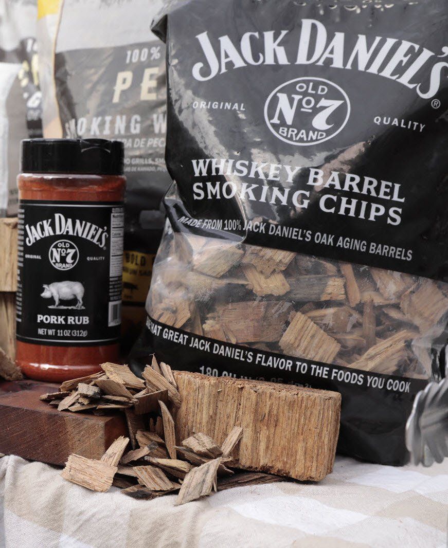 Jack Daniels whiskey barrel chips bag with loose chips and Jack Daniels Pork Rub