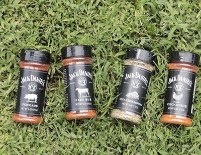 Jack Daniels Pork, Beef, Chicken Rubs & Steak Seasoning on lawn