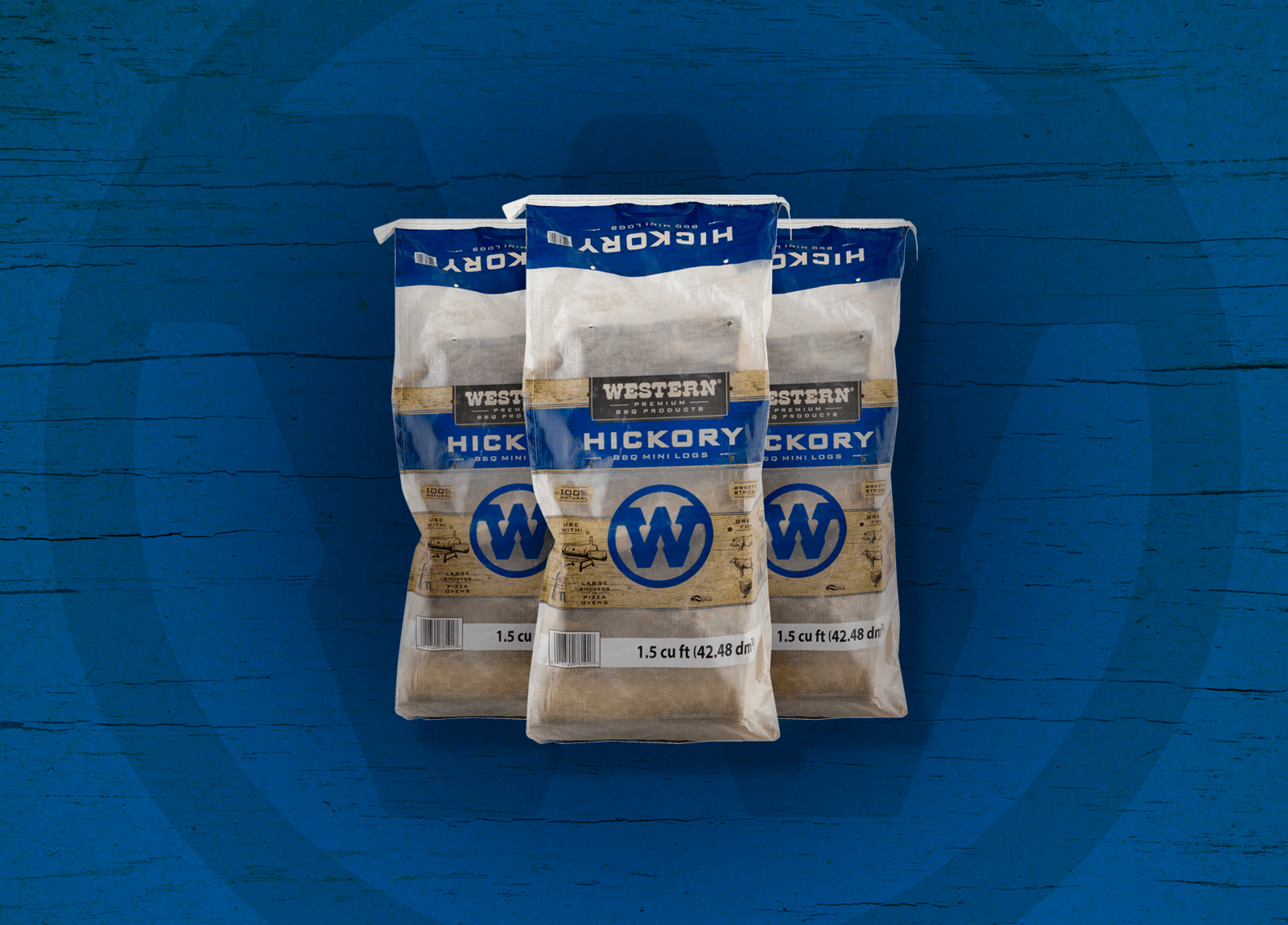 three bags of Western hickory mini logs on a blue background .
