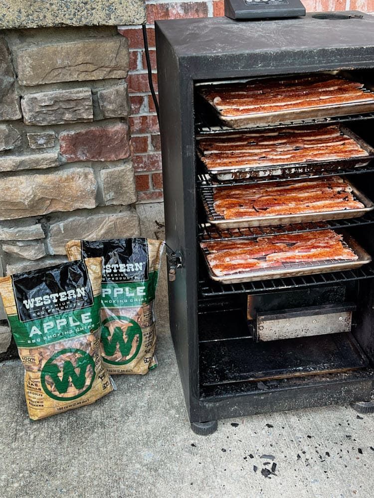 heet pans in smoker with Western Apple BBQ Smoking chips