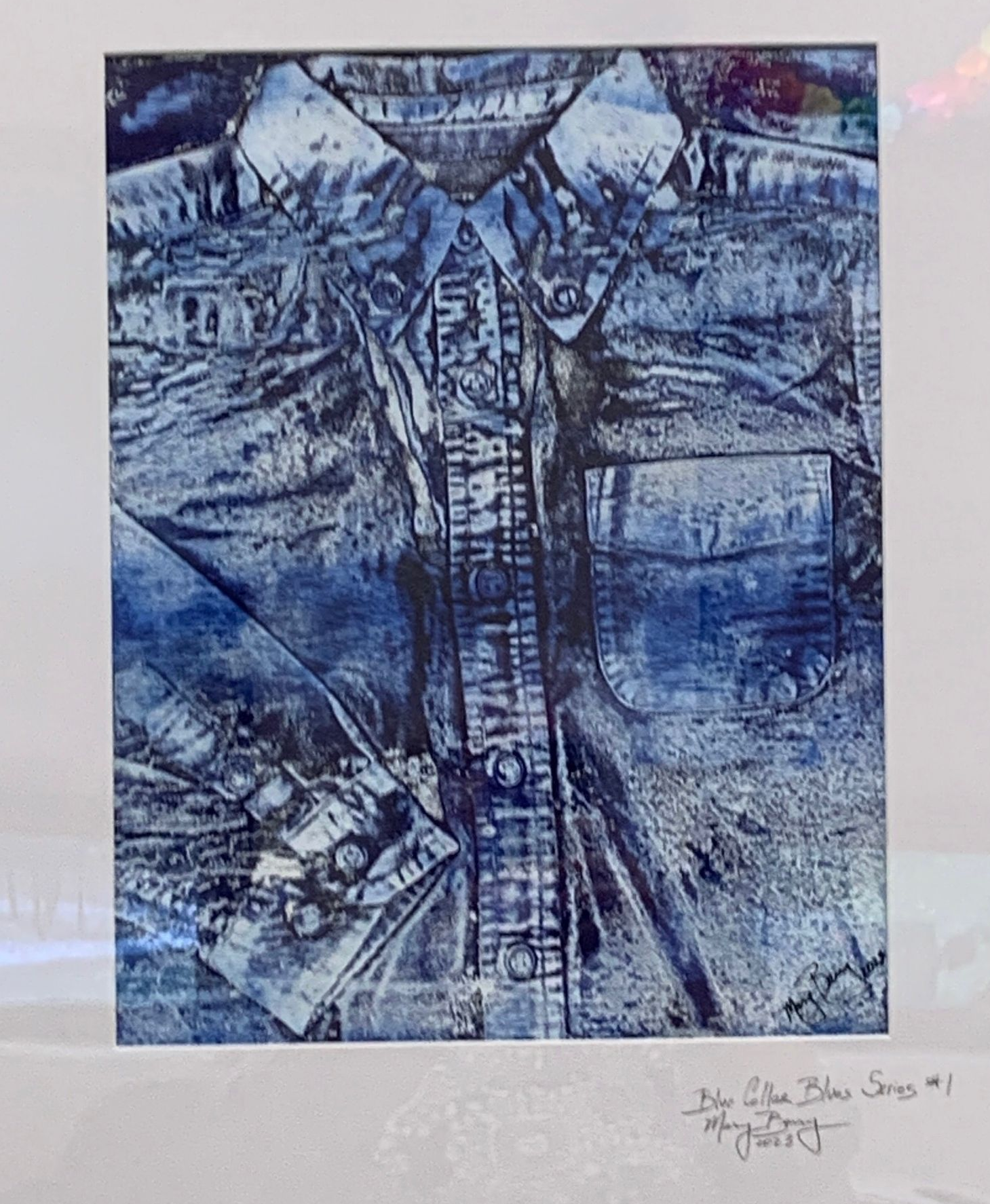 Blue print of a button-down shirt. Dark and light blue shades create texture. By Mary Berry - Art