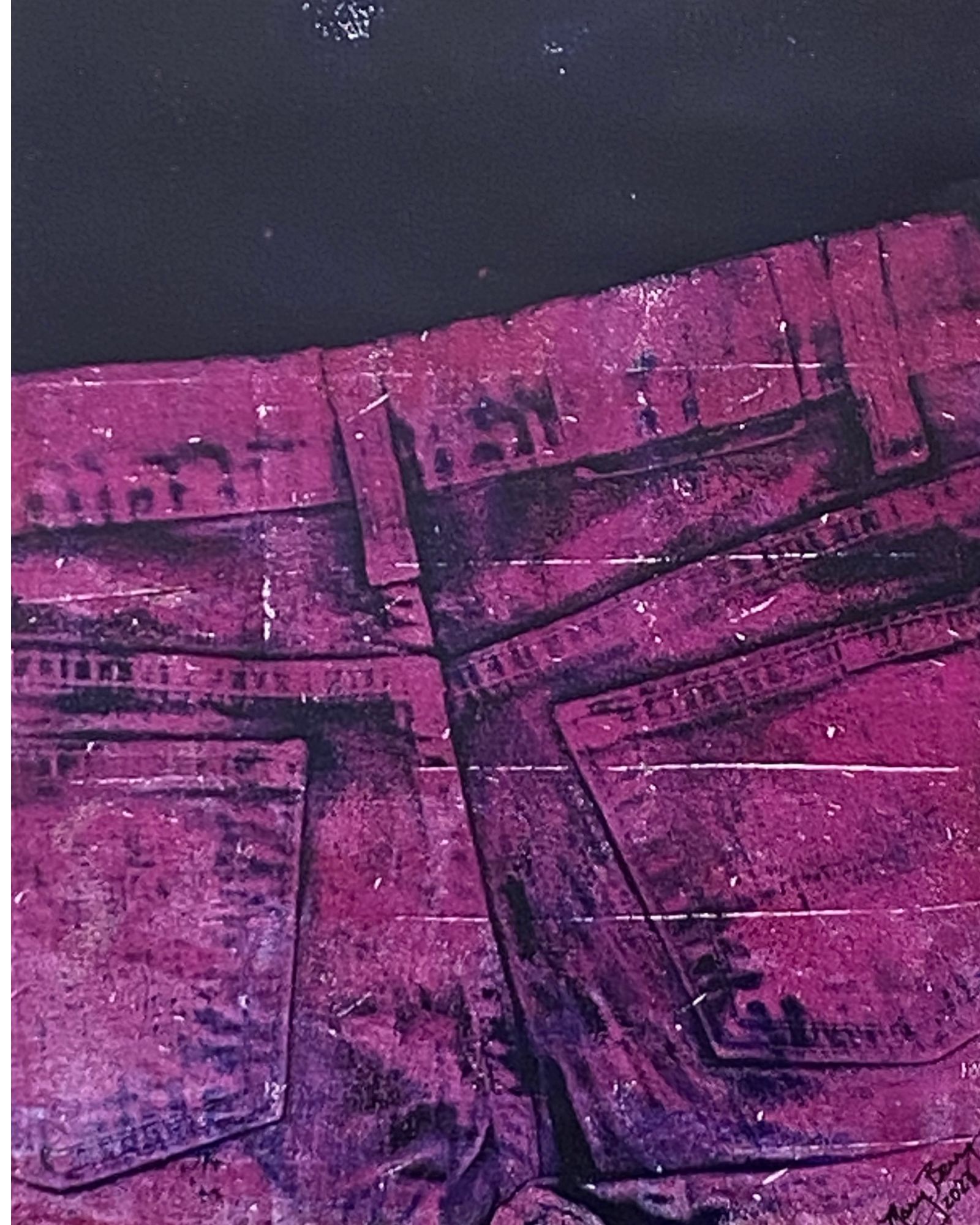 Magenta-colored denim jeans against a dark background, showing pockets and seams.  By Mary Berry - Art