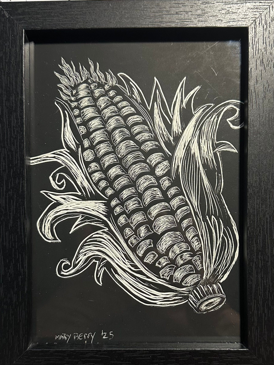 Black and white scratch board of corn on the cob, framed in black.  By Mary Berry - Art