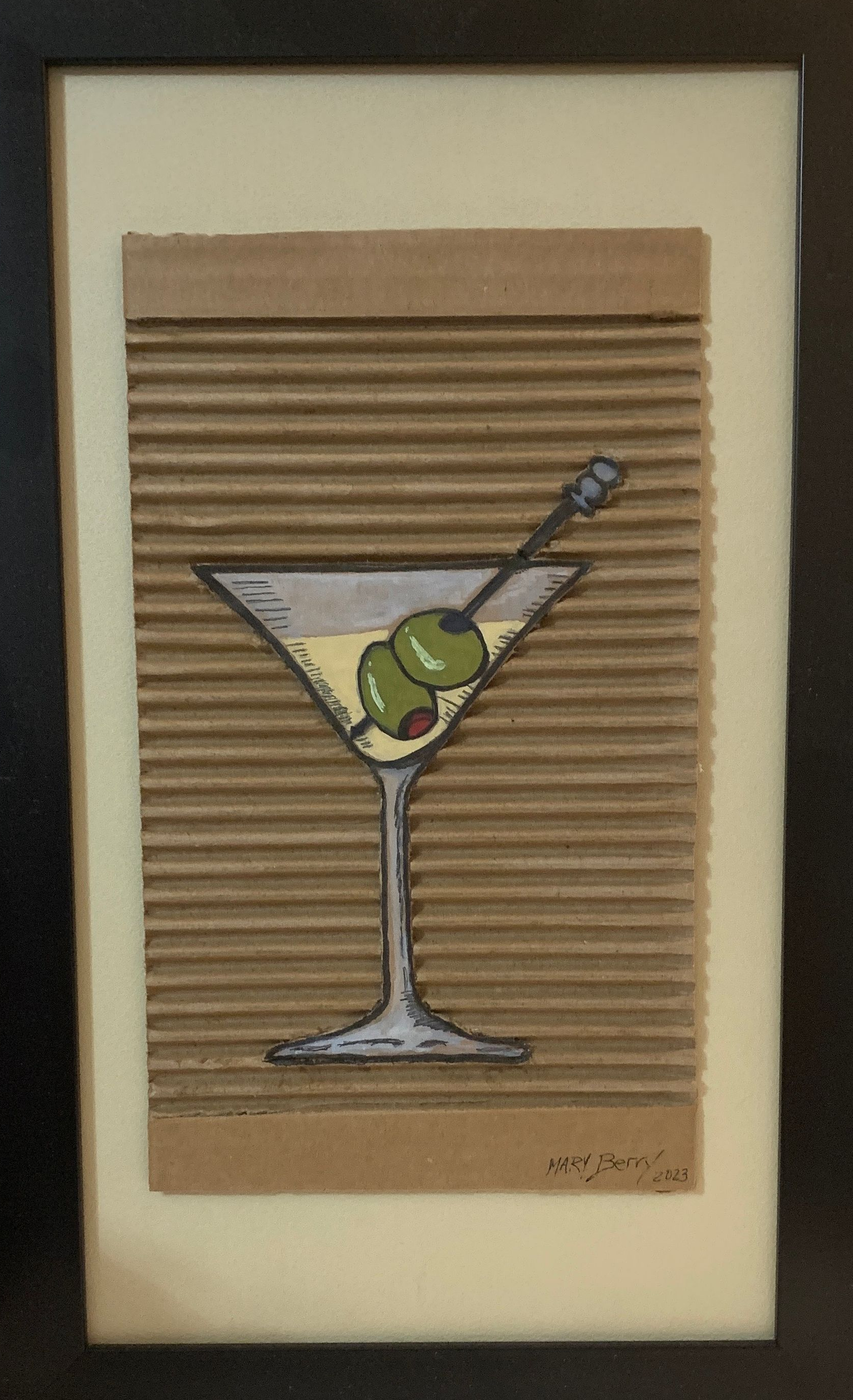Martini glass with olives on corrugated cardboard background.  By Mary Berry - Art