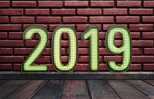 brick wall with 2019 in lights