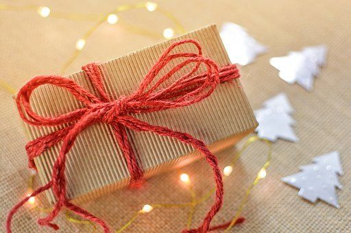 gift wrapped in brown paper and string bow