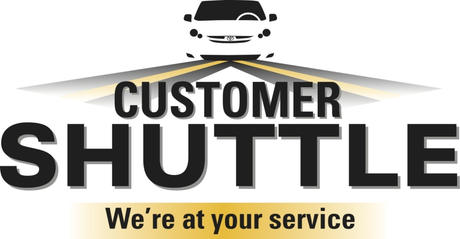 the logo for customer shuttle shows a car driving down a road .