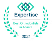 Expertise badge: Best Orthodontists in Atlanta 2021. Turquoise laurel wreath around a logo with interlocking squares.