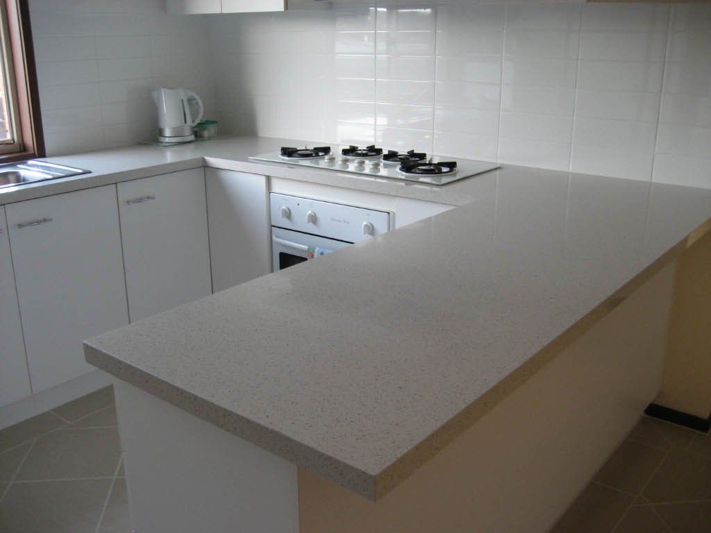 White colour quartz surface installed on the storage cabinets