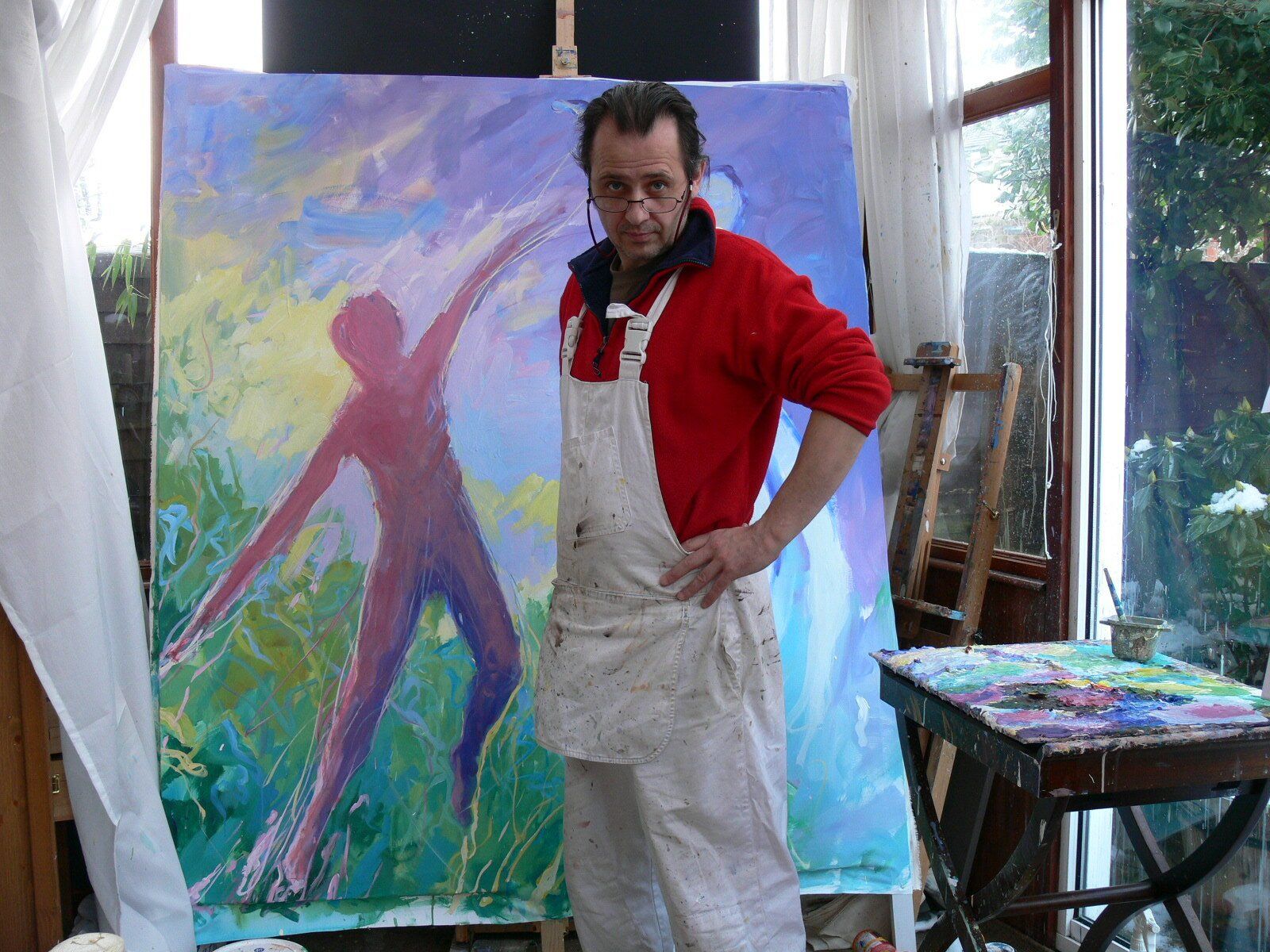 Mariusz Kaldowski in front of his painting to Astor Piazzolla's Summer, tango music - Four Seasons