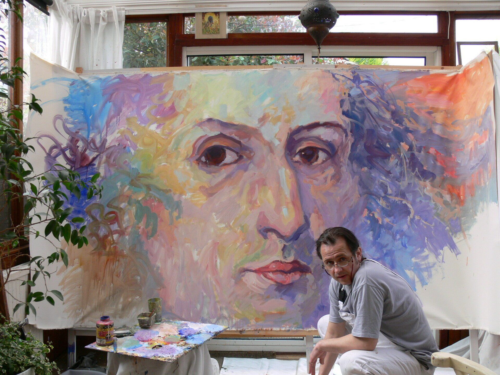 Mariusz Kaldowski during painting of portrait of Chopin