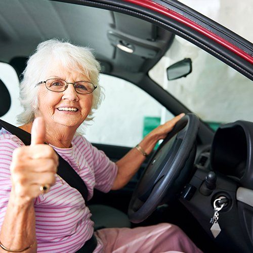 Senior — Senior Woman Getting Driver License in Riverside, CT