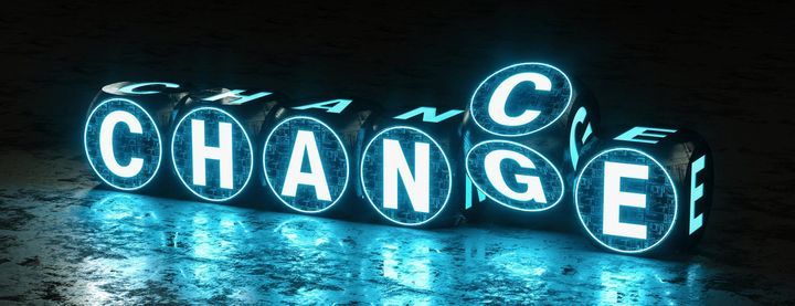 A 3D illuminated word 'change' on a dark background, inspiring hope and transformation.