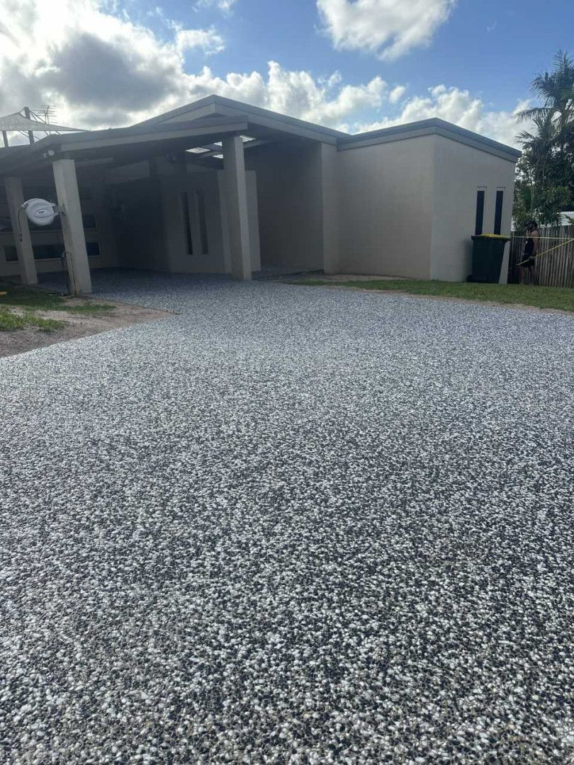 A Pebbled Driveway With A House In The Background — Wieland Contracting In Tolga, QLD