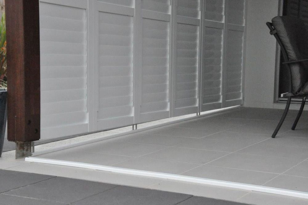 Closer-look Of A White Bi-fold Shutters