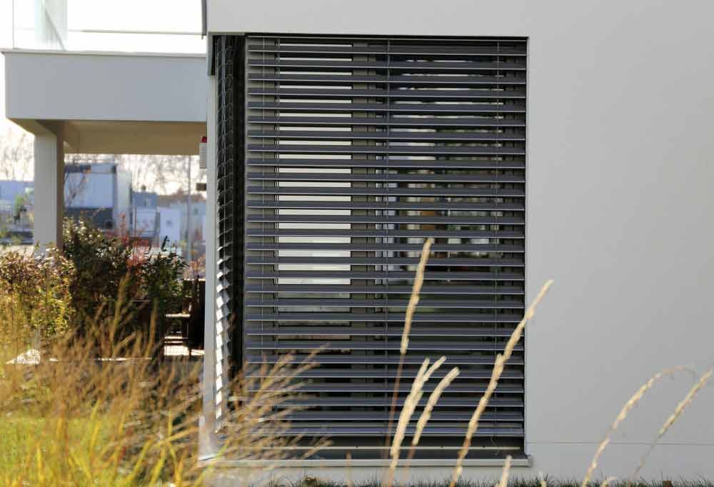 A House With A Window With A Blind On It — Balcony Shutters Australia In Moffat Beach, QLD