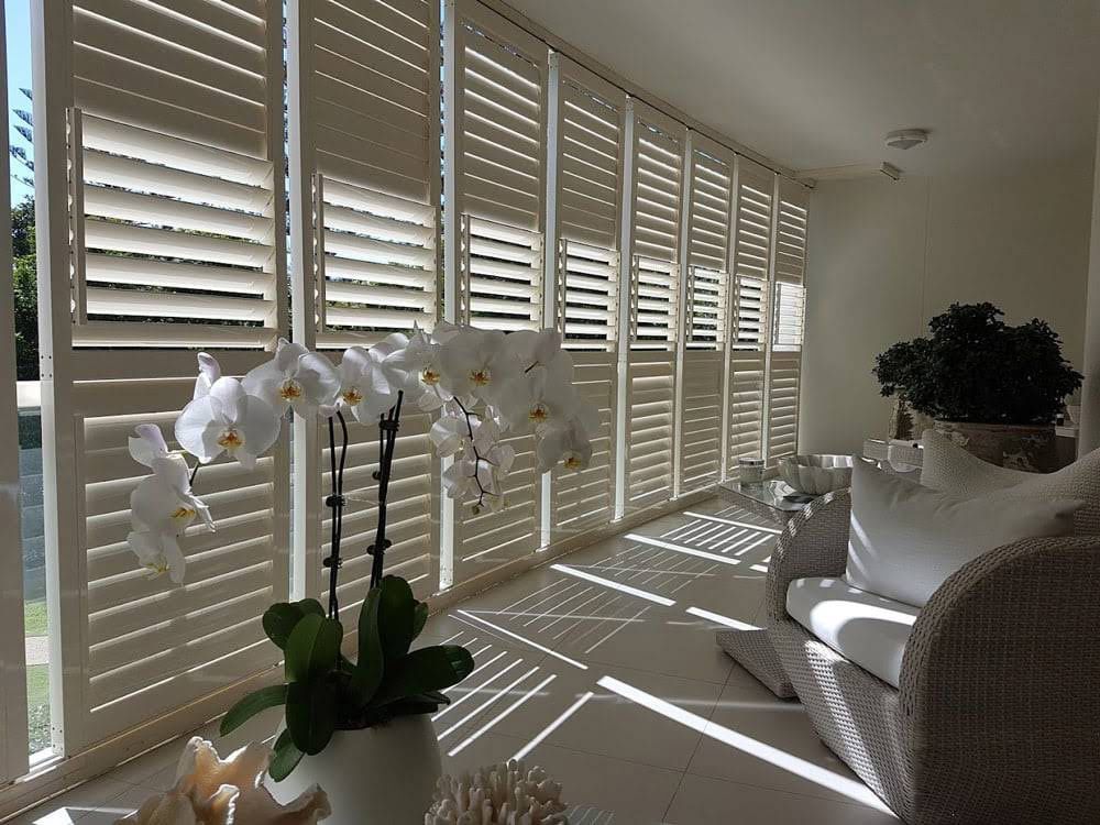 Closed White Balcony Shutters Installed