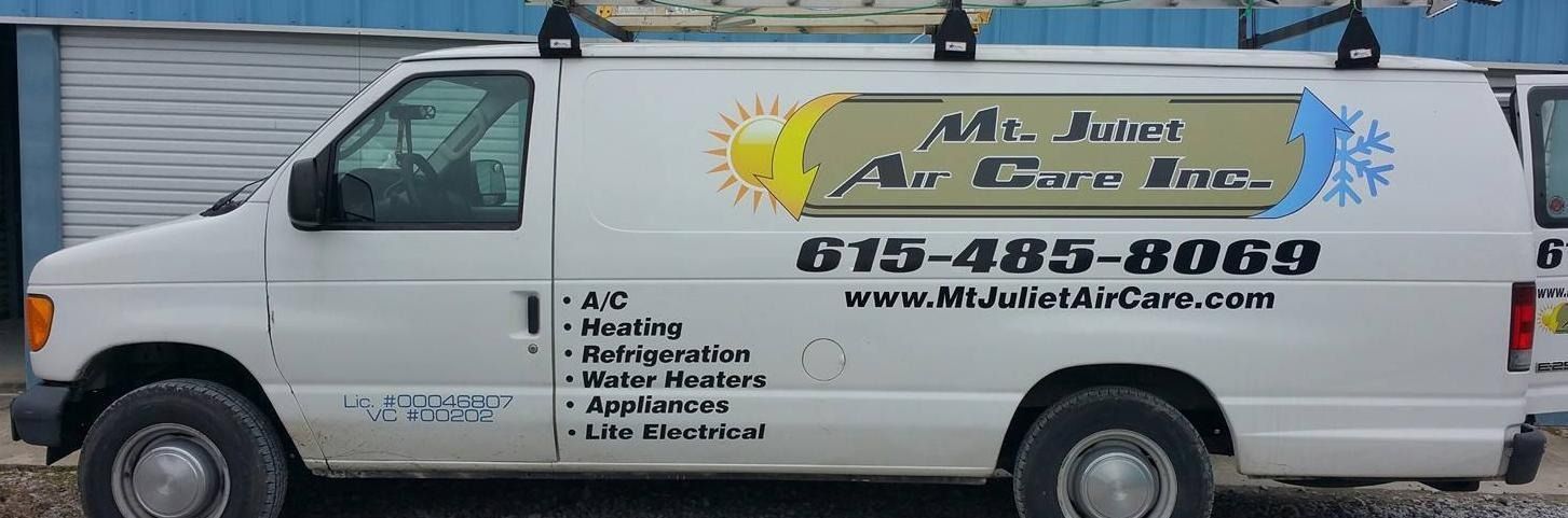 A white service van with "Mt. Juliet Air Cool Inc." branding, a phone number, and a list of HVAC services on its side.