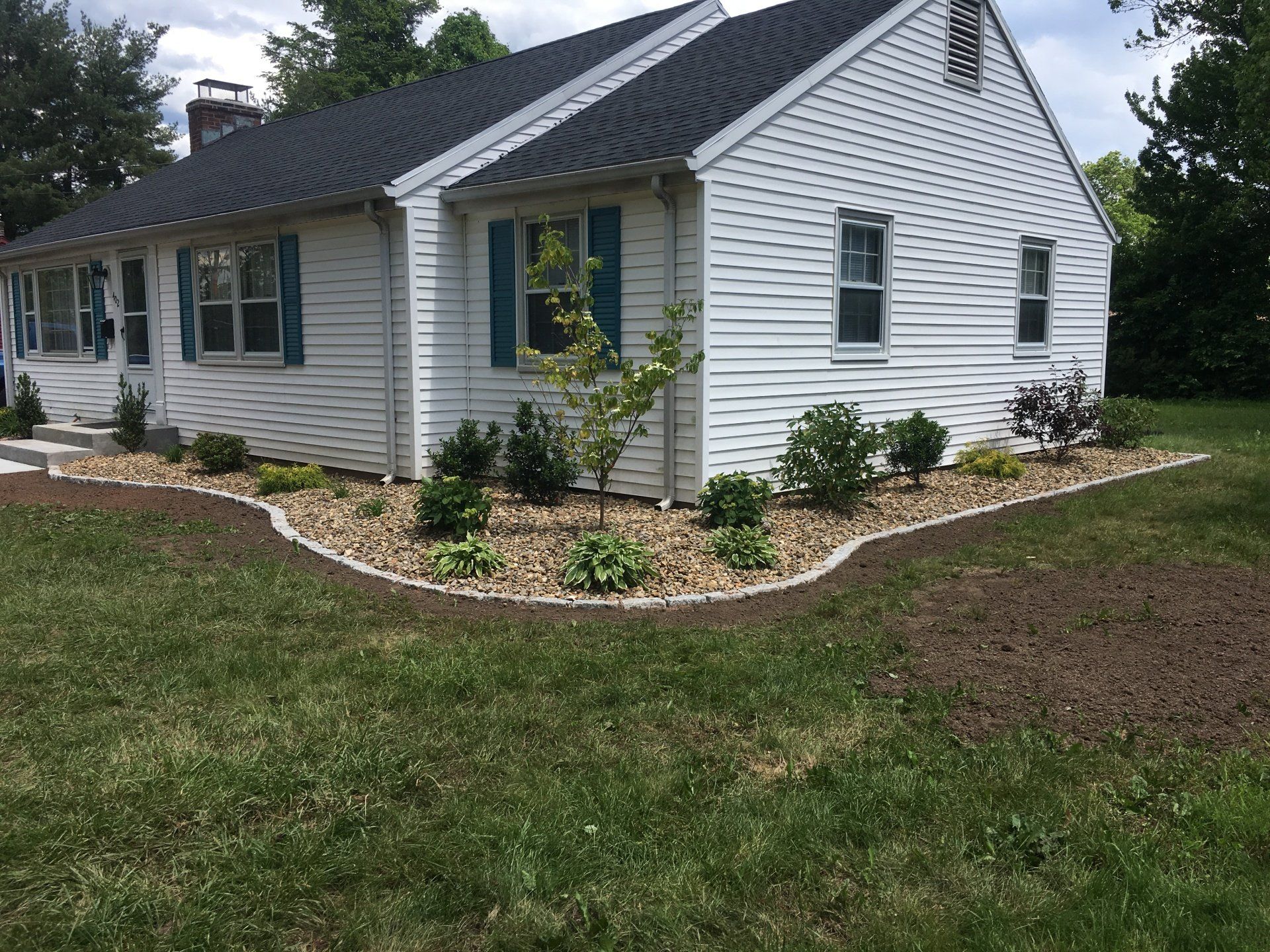 Patio With Landscape Plantings — Landscape Design in Cromwell, CT