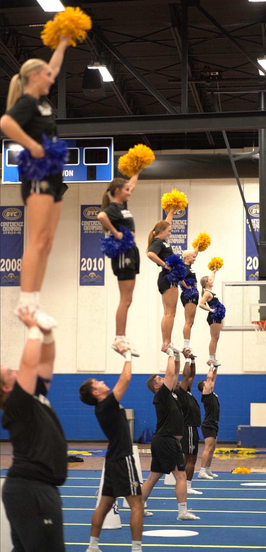 Group of athletes practicing choreography together during an Impact Skills Camp.