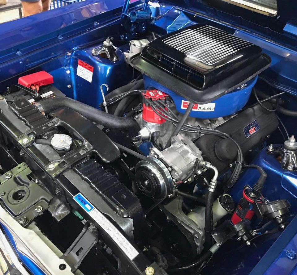 Classic Car Engine Bay with Black Air Cleaner, Radiator, and Various Components — Torque Masters Auto Repairs Centre In Portsmith QLD