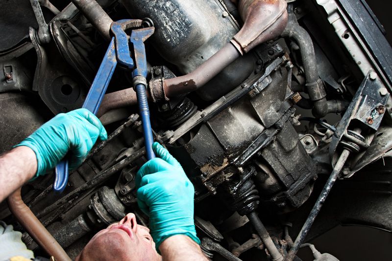 Mechanical repairs a car in the garage — General Mechanical Services in Port Macquarie, NSW