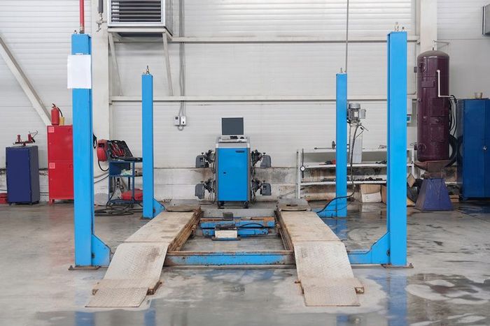 Workshop bay of wheel alignment in a car repair — Motor Mechanics in Port Macquarie, NSW