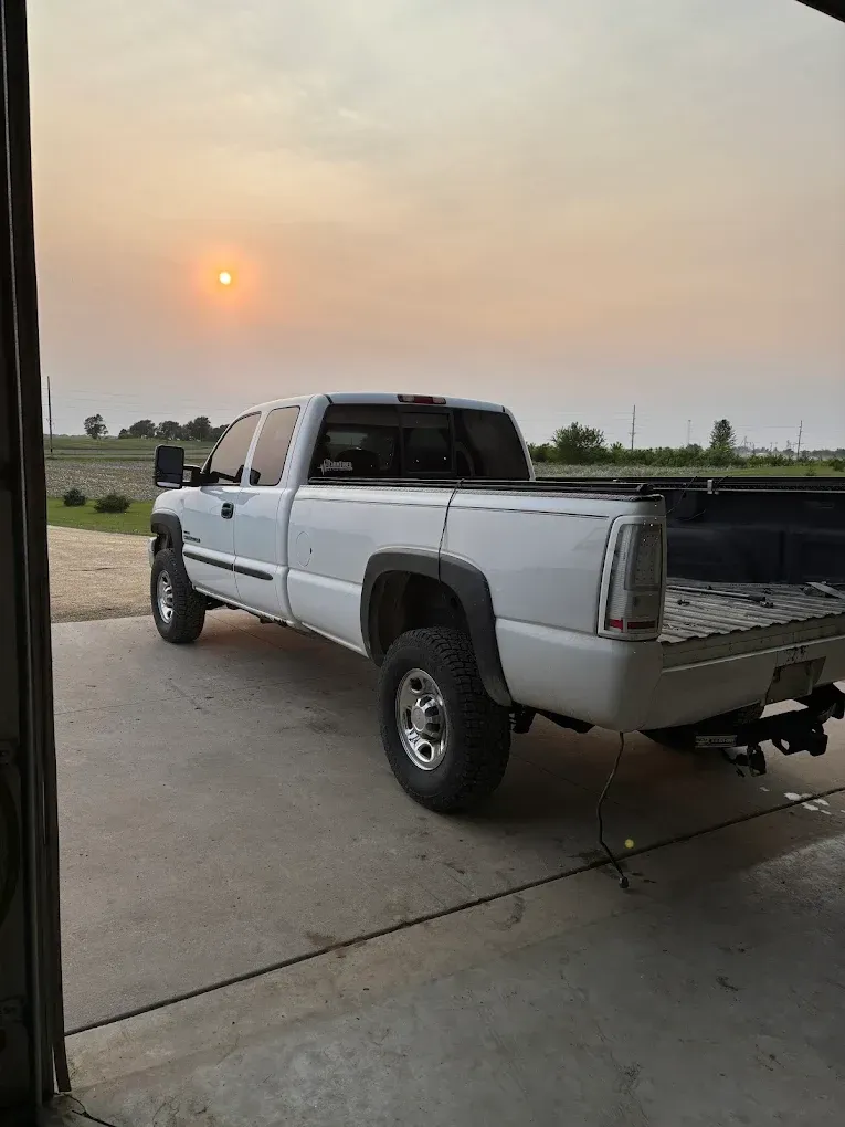 White Pick up Facing Sunset | Farmtuned Performance Diesel & Auto