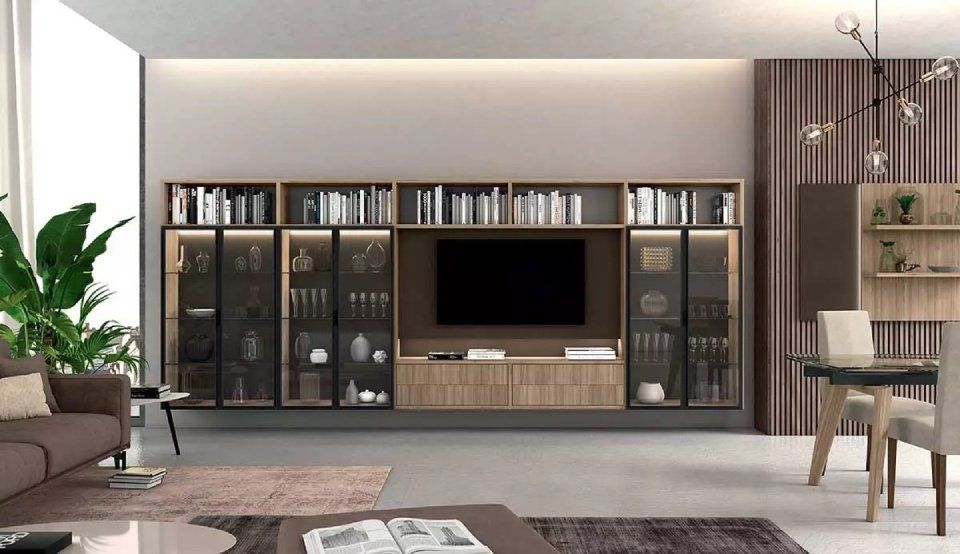 parete attrezzata con pensili con vetri e libreria