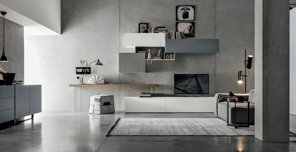 parete attrezzata con mobili bianchi e grigi